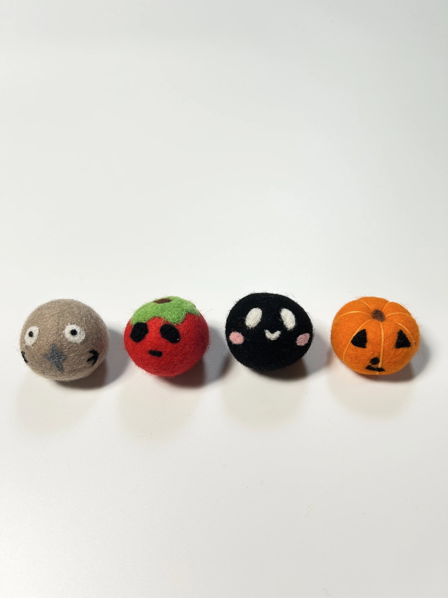 Available color options for Corner Monster felt cat toy balls