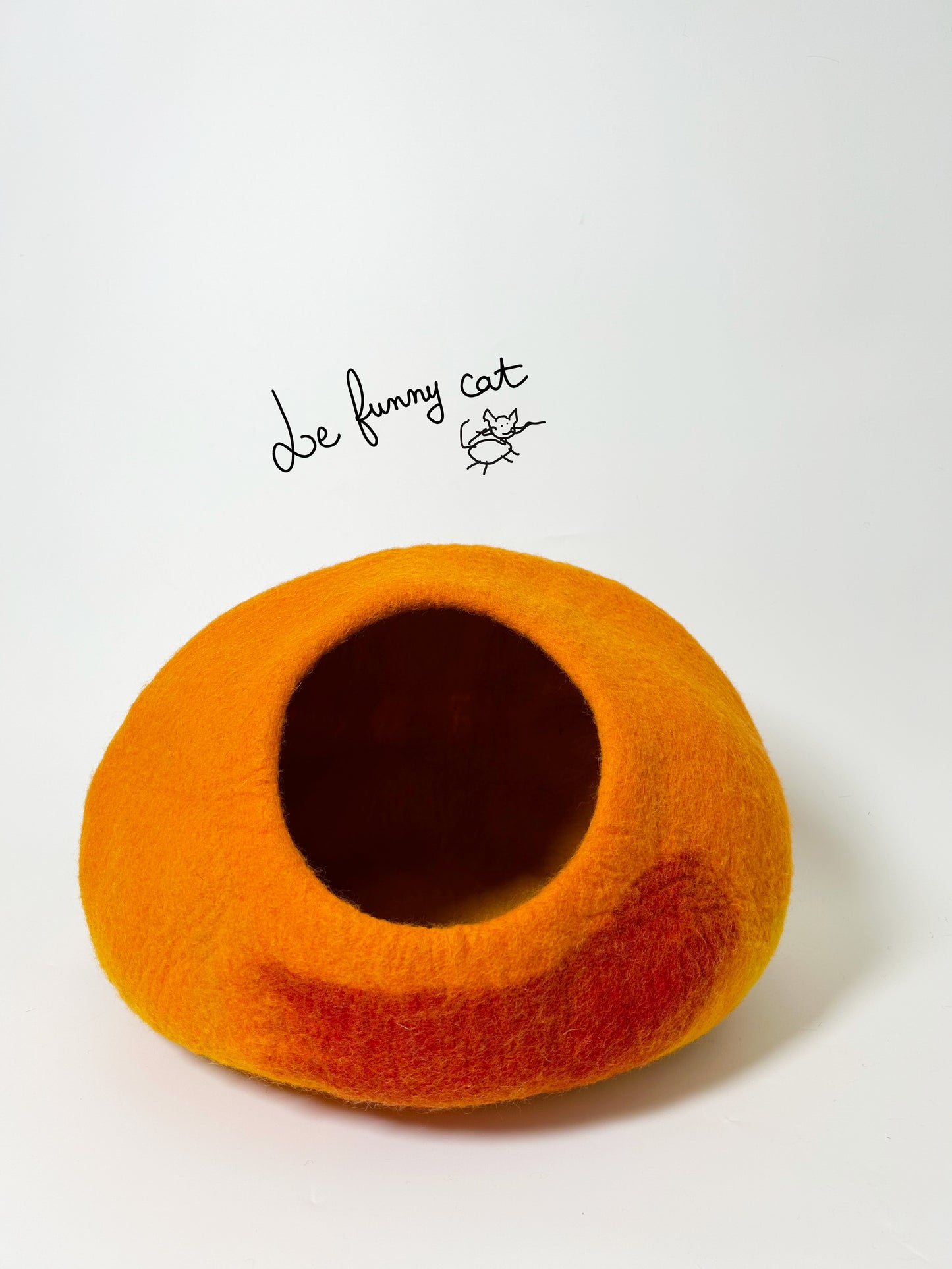 Front view of the Warm Sunset felt cat cave