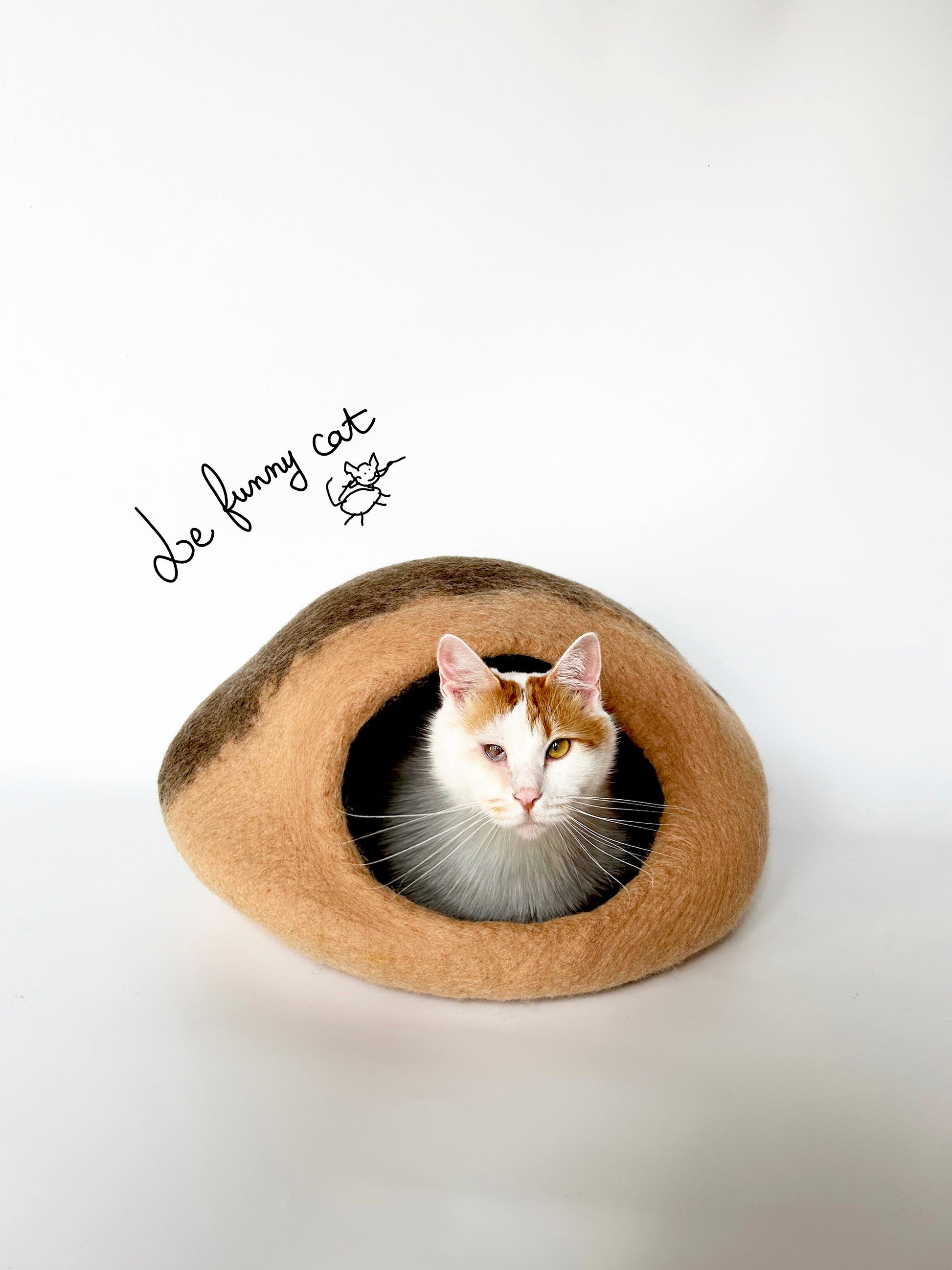 A Chestnut handmade felt cat cave for indoor cats