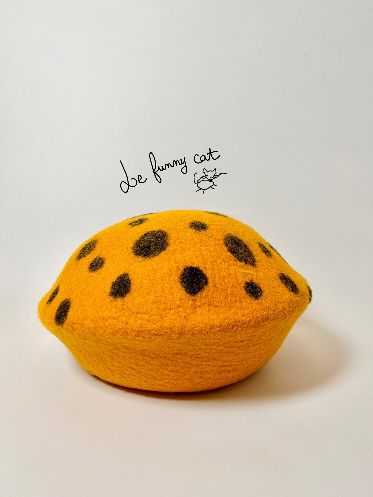 Back view of the Rotten Pumpkin handmade felt cat cave
